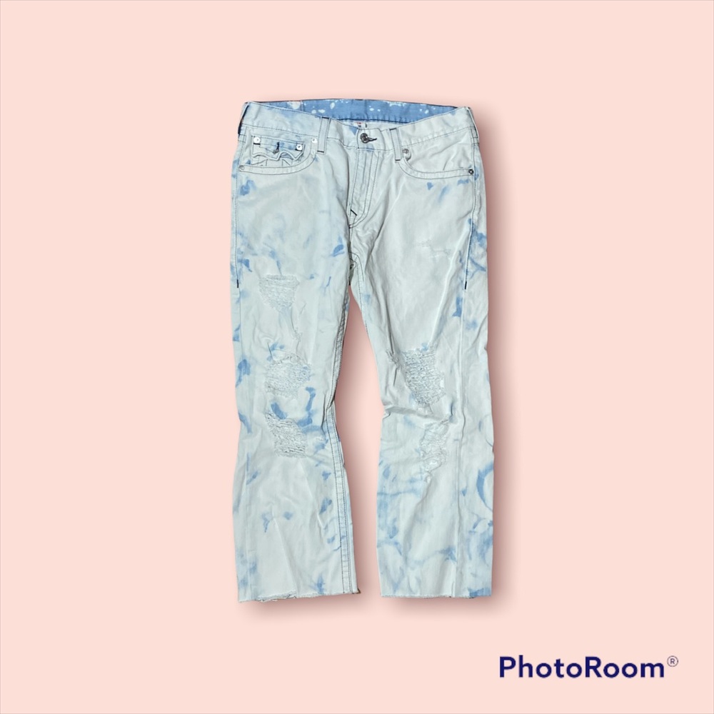 Im selling a pair of distressed white jeans for a great price.